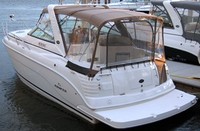 Photo of Rinker 300 Fiesta Vee, 2005: Bimini Top, Front Connector, Side Curtains, Camper Top, Camper Side and Aft Curtains, viewed from Port Rear 