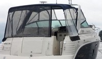 Photo of Rinker 300 Fiesta Vee, 2005: Bimini Top, Front Connector, Side Curtains, Camper Top, Camper Side and Aft Curtains, viewed from Starboard Rear 