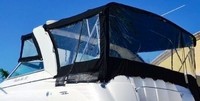 Photo of Rinker 312 Fiesta Vee, 2004: Bimini Top, Connector, Side Curtains, Camper Top, Camper Side and Aft Curtains, viewed from Port Rear 