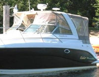 Photo of Rinker 320 Fiesta Vee, 2005: Bimini Top, Connector open, Side Curtains, Camper Top, Camper Side Aft Curtains, viewed from Port Front 