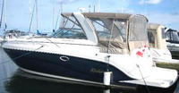 Photo of Rinker 320 Fiesta Vee, 2005: Bimini Top, Connector, Side Curtains, Camper Top, Camper Side Aft Curtains, viewed from Port Rear 