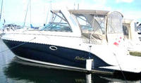 Photo of Rinker 320 Fiesta Vee, 2005: Bimini Connection Connector, Side Curtains, Camper TopConnection, Side Aft Curtains, viewed from Port Side 