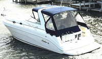 Photo of Rinker 340 Fiesta Vee, 2001: Bimini Top, Bimini Connector, Side Curtains, Camper Top, Camper Side Aft Curtains, viewed from Port Rear 