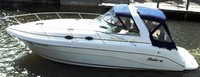 Photo of Rinker 340 Fiesta Vee, 2001: Bimini Top, Bimini Connector, Side Curtains, Camper Top, Camper Side Aft Curtains, viewed from Port Side 