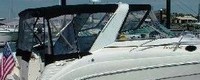 Photo of Rinker 342 Fiesta Vee, 2003: Bimini Top, Front Connector, Side Curtains, Camper Top, Camper Side and Aft Curtains, viewed from Starboard Rear 