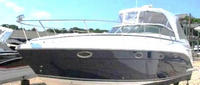 Photo of Rinker 370 Express Cruiser Hard-Top, 2007: Connector, Side Curtains HT Connections, Camper Side Aft Curtains, viewed from Port Front 