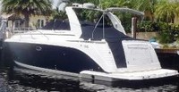 Photo of Rinker 410 Fiesta Vee Express Cruiser Canvas Tops, 2004: Radar Arch Camper Top in Boot, Cockpit Cover, viewed from Port Rear 