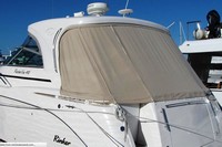 Photo of Rinker 410 Fiesta Vee Express Cruiser Hard-Top, 2005: Visor, Side Curtains, Aft Privacy Curtain, viewed from Port Rear 