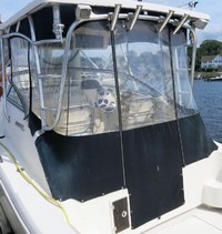Photo of Scout 280 Abaco with Tall WindShield, 2003: Hard-Top, Connector, Side and Aft-Drop-Curtains, viewed from Port Rear 