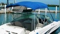 Photo of Sea Ray 200 Sundeck, 2004: Bimini Top, Bow Cover, viewed from Starboard Rear 