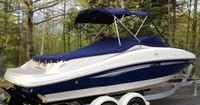 Photo of Sea Ray 210 Select, 2007: Bimini Top in Boot, Cockpit Cover with Bimini Cutouts, viewed from Starboard Rear 
