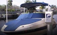 Photo of Sea Ray 220 Sundeck, 2004: Bimini Top, Bow Cover Cockpit Cover, viewed from Port Front 