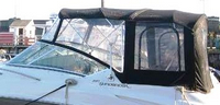 Photo of Sea Ray 240 Sundancer NO Arch, 2007: Bimini Top, Front Connector, Side Curtains, Camper Top, Camper Side and Aft Curtains, viewed from Port Side 