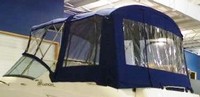 Photo of Sea Ray 240 Sundancer NO Tower, 2008: Bimini Top, Front Visor, Side Curtains, Camper Top, Camper Side and Aft Curtains, viewed from Port Rear 