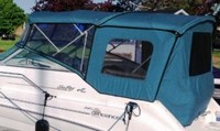 Photo of Sea Ray 240 Sundancer, 1996: Bimini Top, Front Visor, Side Curtains, Camper Top, Camper Side and Aft Curtains, viewed from Port Rear 