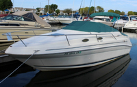 Photo of Sea Ray 240 Sundancer, 1997: Bimini Top in Boot, Cockpit Cover, viewed from Port Front 