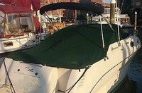 Photo of Sea Ray 240 Sundancer, 2000: Bimini Top in Boot, Cockpit Cover, viewed from Starboard Rear 
