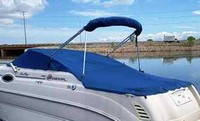 Photo of Sea Ray 240 Sundancer, 2001: Bimini Top in Boot, Cockpit Cover with Bimini Cutouts, viewed from Port Rear 