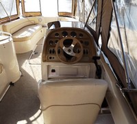 Photo of Sea Ray 240 Sundeck, 1999: Forward Camper Top Aft and Side Curtains, viewed from Starboard Bimini Side Curtain, Inside 