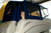 Photo of Sea Ray 245 Weekender, 2001: Bimini Top, Front Visor, Side Curtains, Camper Top, Camper Side and Aft Curtains, viewed from Starboard Rear 
