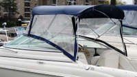 Photo of Sea Ray 245 Weekender, 2001: Bimini Top, Front Visor, Side Curtains, viewed from Port Rear 