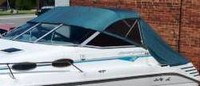 Photo of Sea Ray 250 Express Cruiser, 1994: Convertible Top Convertible, Side and Aft Curtains, viewed from Port Front 