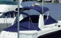 Photo of Sea Ray 260 Sundancer Arch, 2004: Bimini Top, Sunshade Top, Camper Top in Boot, Cockpit Cover with Bimini and Camper Frame Cutouts, viewed from Port Rear 