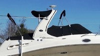 Photo of Sea Ray 260 Sundancer Arch, 2006: Bimini Top in Boot Sunshade Top, Camper Top in Boot, Cockpit Cover with Bimini and Camper Frame Cutouts, viewed from Starboard Side 