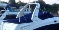 Photo of Sea Ray 260 Sundancer Arch, 2007: Bimini Top in Boot, Camper Top in Boot, Cockpit Cover with Bimini and Camper Frame Cutouts, viewed from Starboard Rear 