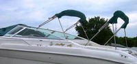 Photo of Sea Ray 280 Cuddy Cabin, 1997: Bimini Top in Boot, Camper Top in Boot, viewed from Port Side 