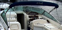 Photo of Sea Ray 280 Sun Sport No Arch, 1999: Bimini Top in Boot, viewed from Port Rear 