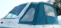 Photo of Sea Ray 290 Sundancer Arch, 1994: Convertible Top, Side Curtains, Camper Top, Camper Side and Aft Curtains, viewed from Port Rear 