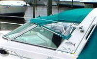 Photo of Sea Ray 300 Sundancer, 1995: Convertible Top Teal Tweed, viewed from Port Rear 