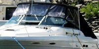 Photo of Sea Ray 300 Weekender, 1993: Bimini Top, Bimini Visor, Bimini Side Curtains Bimini Aft Curtain, viewed from Port Front 
