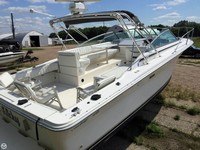 Photo of Sea Ray 310 Amberjack, 1994: Bimini Top in Boot, viewed from Starboard Rear 