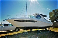 Photo of Sea Ray 330 Sundancer, 2014: Hard-Top, Front Visor, Side Curtains, Sunshade Top, Camper Top, viewed from Port Front 