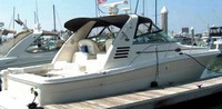Photo of Sea Ray 340 Amberjack, 2003: Bimini Top, Front Visor, Side Curtains, Arch Connections Sunshade Top, viewed from Starboard Rear 