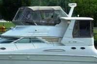 Photo of Sea Ray 420 Aft Cabin, 1998: Bridge Bimini Top and Enclosure Curtains, Aft Hard-Top, Side and Aft Curtains, viewed from Port Side 
