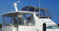 Photo of Sea Ray 420 Aft Cabin, 2000: Bridge Bimini Top and Enclosure Curtains, Aft Hard-Top, Side and Aft Curtains, viewed from Starboard Rear 