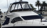 Photo of Sea Ray 44 Sedan Bridge, 2006: Bridge Hard-Top, Visor, Side Curtains, Aft Cockpit Cover WindShield Cover, viewed from Starboard Front 