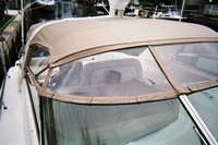 Photo of Sea Ray 450 Sundancer, 1996: Bimini Top, Visor, Side Curtains, viewed from Starboard Front, Above 