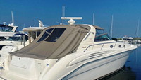 Photo of Sea Ray 450 Sundancer, 1996: Bimini Visor, Side Curtains, Sunshade, Sunshade Aft Enclosure with Windows in Linen Tweed, viewed from Starboard Rear 