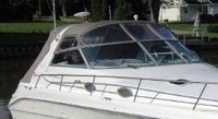 Photo of Sea Ray 500 Sundancer, 1998: Bimini Top, Front Visor, Side Curtains, Sunshade Top and Enclosure, viewed from Starboard Front 