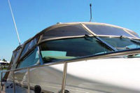 Photo of Sea Ray 500 Sundancer, 1999: Bimini Top, Visor, Side Curtains, Sunshade Top, Sunshade, Side and Aft Curtains, viewed from Starboard Bow 
