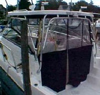 Photo of Seaswirl Striper 2901WA, 2007: Hard-Top, Connector, Side Curtains, Aft-Drop-Curtain, viewed from Port Rear 