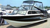 Photo of Starcraft Islander 221, 2012: Bimini Top, Side Curtains, Aft Curtains, viewed from Port Front 