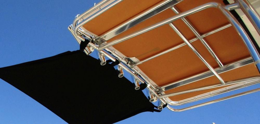 T-Shade-Kit™Carver(r) T-Shade(tm) 4, 5 or 6 foot Long X 5 foot Wide T-Top Shade Extension Kit connects to rear (or front) of a T-Top to provide additional shade AND RAIN protection (By comparison, the Laporte(r) Boat-Shade-Kits are stretchier and NOT usable in the rain)