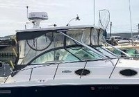 Photo of Wellcraft Coastal 290, 2013: Hard-Top, Front Connector, Side Curtains, viewed from Starboard Front 