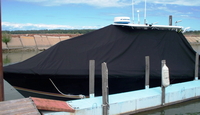 Photo of Contender 31 Fish Around, 2005: LaPorte&trade; T-TopCover TTopCover&trade; T-Top boat cover on lift, viewed from Starboard Front from RnR-Marine&trade; 
