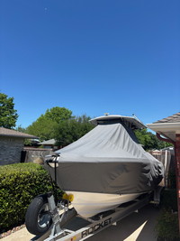 Photo of Edgewater 245CC 20xx TTopCover™ T-Top boat cover Smoke Grey Sunbrella, viewed from port front  (Factory OEM) 